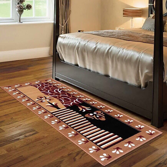 Decorative rug with floral pattern on a wooden floor in a bedroom.