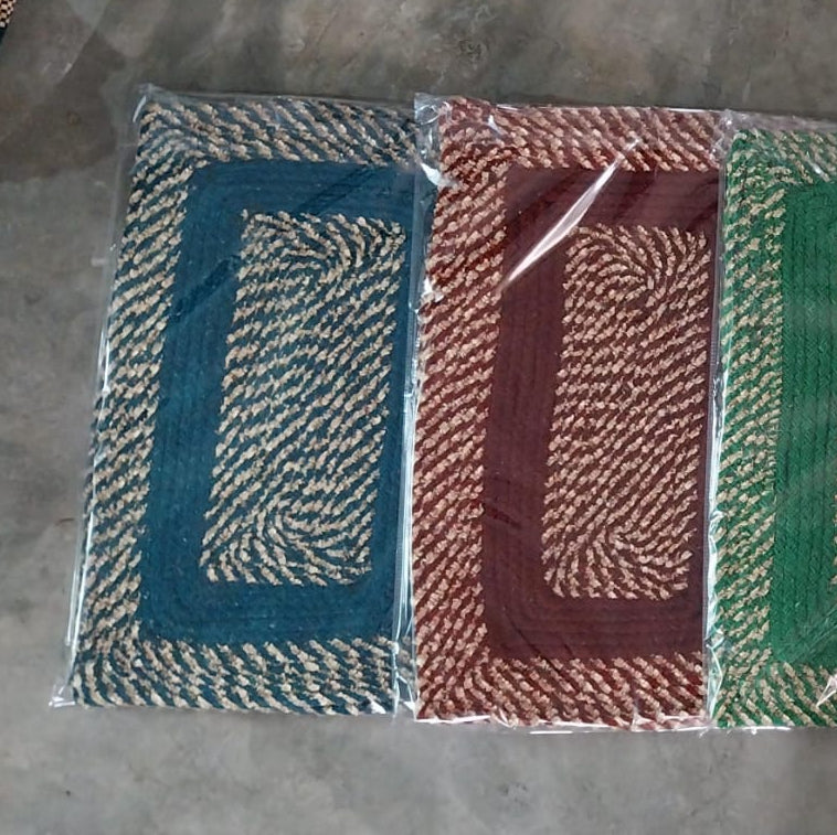 Set of four woven name tags in different colors on a gray background