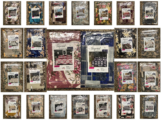 Collection of framed artworks with various designs and text on a textured surface.