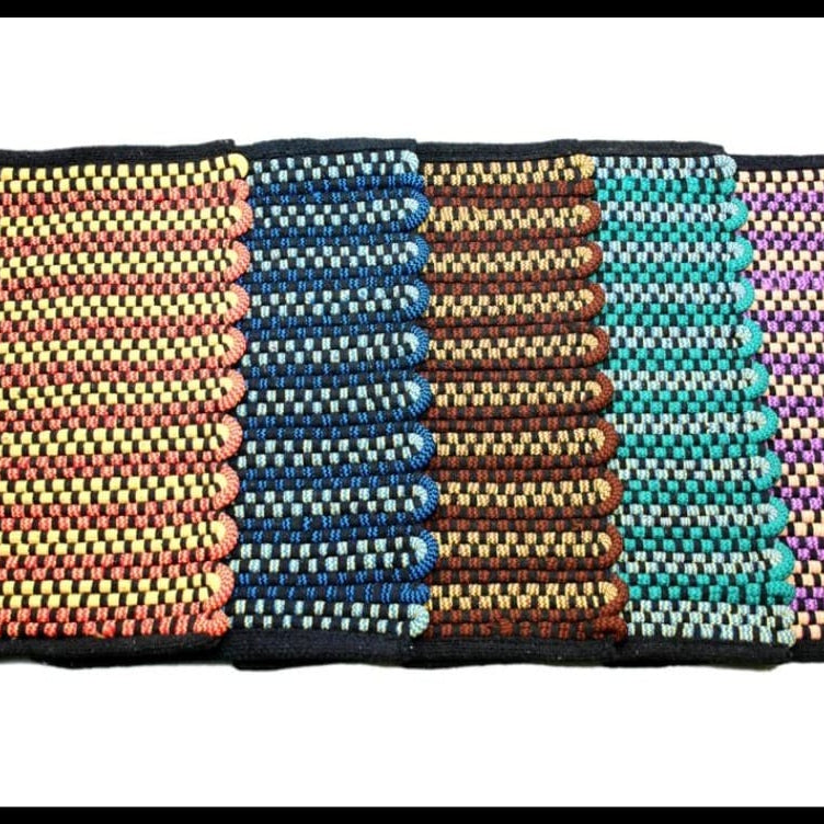 Multicolored woven belt with a striped pattern on a white background